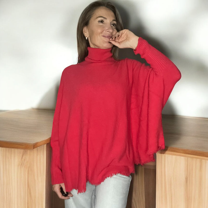 Pull corail col roulé à Franges